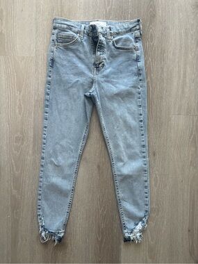 Topshop Petite high rise Jamie jeans with bottom fringe rips in light blue wash